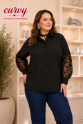 A classy plus-size blouse with lace sleeves